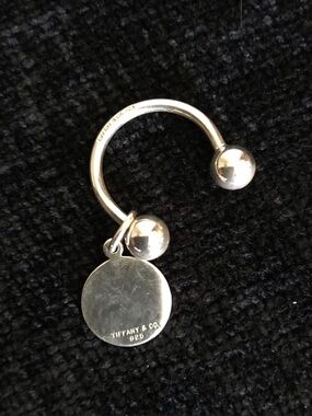 Tiffany & Co Sterling silver horse shoe key ring with dangling charm